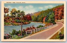 Wallace Idaho~Highway By Coeur d'Alene River~Linen Greetings Postcard 1933 picture