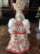 Russian Porcelain Doll In Traditional Folk Costume picture