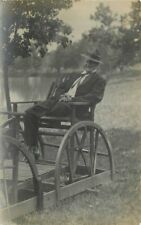C-1910 Man Lakeside Wagon Swing Chair RPPC Photo Postcard 21-13314 picture