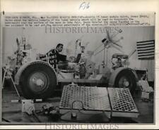 1971 Press Photo Astronaut James Irwin shows the lunar roving vehicle, Florida picture