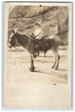 1910 Little Kid Riding Donkey Manitou Colorado CO RPPC Photo Antique Postcard picture