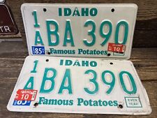 VINTAGE IDAHO LICENSE PLATE SET BA 390 1985 WHITE/GREEN 1A ADA COUNTY picture