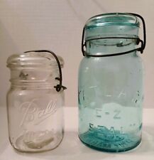 **2** VINTAGE CANNING JARS WITH GLASS LIDS & WIRE CLAMPS FOR LIDS picture