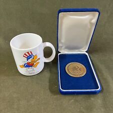 1984 Los Angeles, Olympics XXIII Coin,  2 1/4” Dia & Sam The Eagle Athletics Mug picture