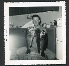 Sleepy Fisherman Man Holds Armload of Fish Vintage Photo 1950s Interior Kitchen picture