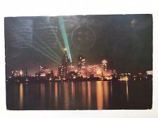 Vintage 1952 Detroit Skyline At Night Seen From Windsor Canada Shore Postcard picture