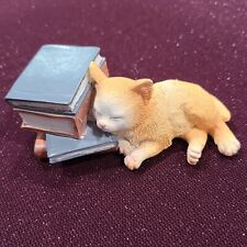 Orange Cat Nap Figurine Cat Sleeping on Stack of Books picture