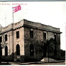 1907 Waterloo, IA Government Building Hand Colored Flag Litho Photo Postcard A36 picture