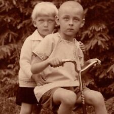 Vintage RPPC Postcard c1906 Two Children Sitting on Bicycle / Tricycle  picture