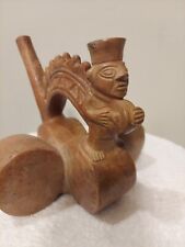 pre Columbian pottery hi priest standing on circle of 4 drums & elaborate arch. picture