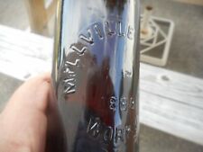 1888 MILLVILLE BOTTLE WORKS Embossed Brown Glass Bottle Wire Bail Porcelain Cap picture