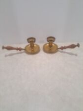 Pair of brass candlesticks with wood handles picture