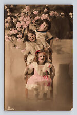 RPPC Hand Colored Studio Portrait Young Boy & Two Girls Flowers Ladder Postcard picture