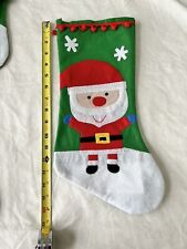 Christmas Stocking Santa Claus With Red Pom Poms. Made Of Felt picture