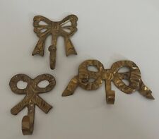 Vintage Brass Bow Hooks Set Of 3 picture