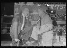 Residents of Crystal City,Texas,talking in front of grocery store,FSA,1939 picture
