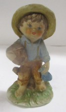 Vintage Ceramic Bisque Little Figurine of Boy in Overalls picture