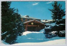 Postcard SUN VALLEY RESORT Idaho lodge with sun logo in snow circa 1960s picture