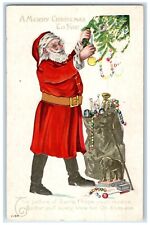 c1910's Merry Christmas Santa Claus Sack Of Toys Embossed Antique Postcard picture