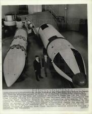 1967 Press Photo Men with full scale mock-ups of Lockheed's Polaris and Poseidon picture