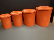 Vintage 1970's Tupperware Orange 4 Piece Nesting Canister Set w/Servalier Lids picture