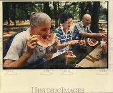 1988 Press Photo Elderly's enjoy their watermelon - noc53124 picture