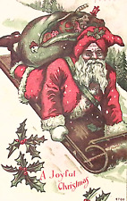 Santa Rides Toboggan with Bag of Toys Gilt Trim Holly Christmas Postcard 1908 picture