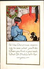 Postcard c1916 Cute Girl Playing w Kitten at Fireplace Waiting for Santa Claus picture