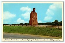 c1960's Abraham Lincoln Statue Scene Highway Clouds Cheyenne Wyoming WY Postcard picture