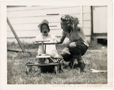 1948 Parsons Kansas Baby in Scooter Cries Girl Mocks Her picture