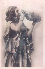 ALGERIA young bedouin girl drinking RPPC 1910s picture