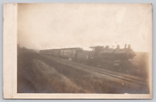 UNIDENTIFIED STEAM ENGINE TRAIN IN MOTION ON RAILROAD TRACKS REAL PHOTO c 1910s picture
