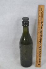 antique dark green beer bottlew /lion 