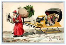 1910 Merry Christmas Horse Sleigh And Toys Snow Winter Embossed Antique Postcard picture