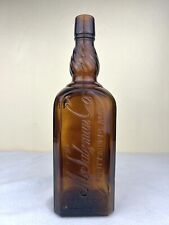 M Salzman Co. Purity Above All Amber Twist Neck Bottle 1 QT  11.5” Early 1900’s picture