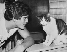 American actor Matt Dillon with his cat 