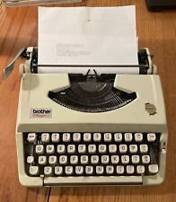 VINTAGE BROTHER CHARGER 11 TYPEWRITER with COVER & PORTABLE HANDLE FOR PARTS REP picture