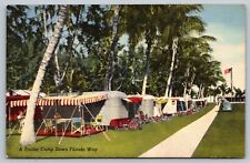A Trailer Camp Down Florida FL Way Flower Grounds And Palm Trees View Postcard picture