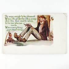 Smoking Hobo Warming Feet Postcard c1908 Campfire Homeless Man Canned Food C1802 picture