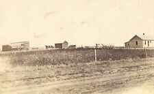 Real Photo Postcard-Farm Unknown location. Old cars picture