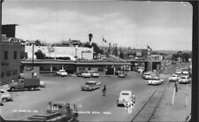 RPPC Postcard Mexico Nogales Son 1950s Street Scene Rail Road tracks Classic Car picture