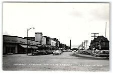 c1950s Adams Street At Elm St. Creston IA Postcard Rppc Cars Mahans Hardware picture