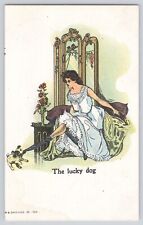 Postcard The Lucky Dog Pulling On Lady's Stocking Vintage Antique Unposted picture