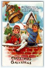 c1910's Christmas Greeting Children Ringing Bell Shamrock Gel Gold Gilt Postcard picture