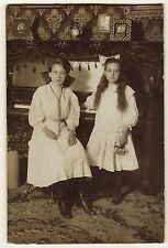 TWO YOUNG GIRLS AND A PIANO IN KANSAS CITY, MISSOURI  (CABINET CARD) picture