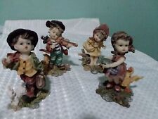 Children figurines with Little  Animals.  Lot Of 4  picture