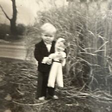 VINTAGE PHOTO Creepy Boy And Large Doll Spooky Vibes 1950s ORIGINAL SNAPSHOT picture