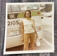 Vintage Photo Of An Classy African American Woman Standing In Front Of A Bus  picture