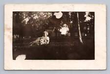 Happy Toddler Playing w Dog in Yard RPPC Antique American Pet Photo ~1910s picture