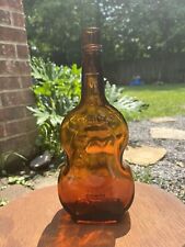 Vintage 1930’s Guitar Shaped - Amber Glass  Whiskey Bottle picture